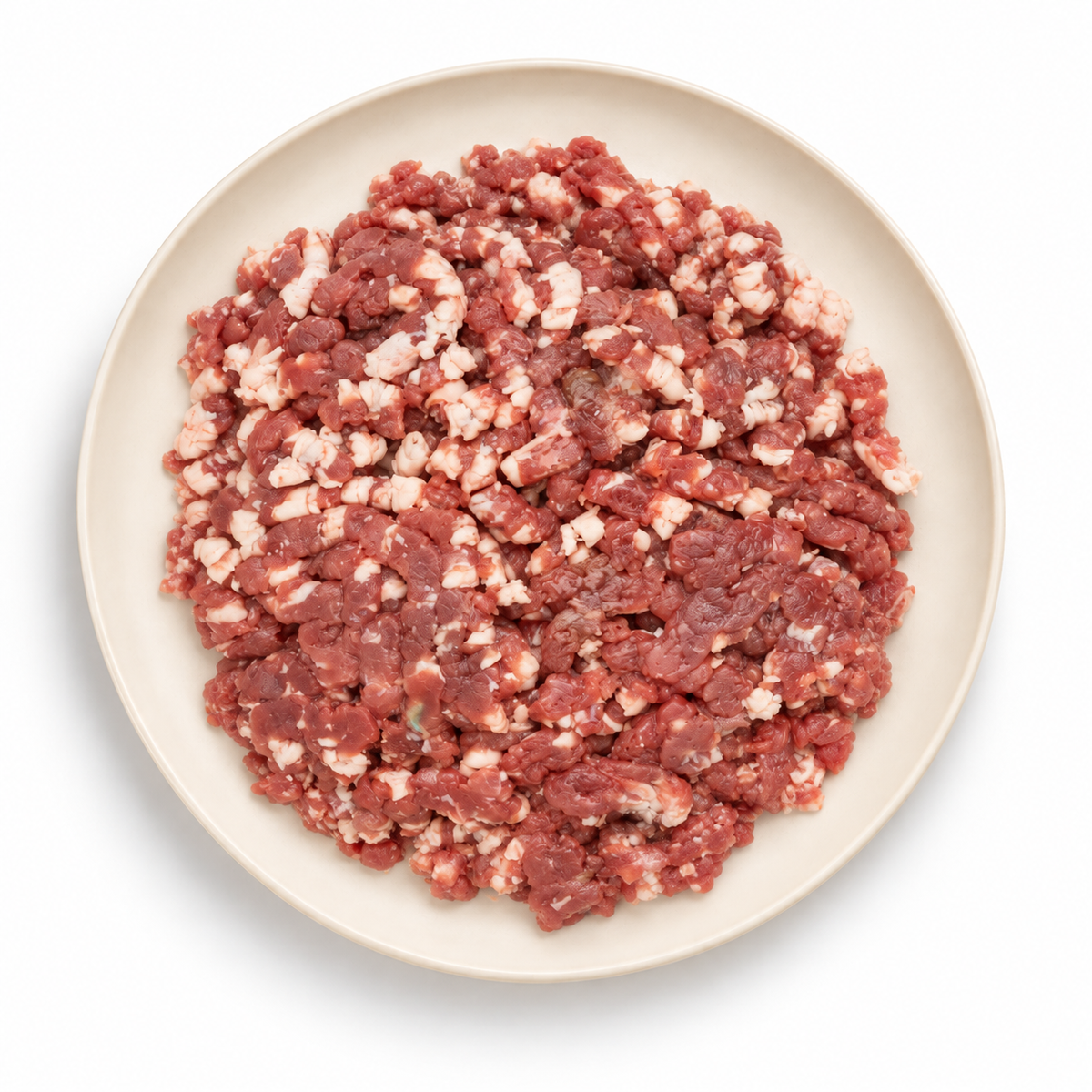 Lamb mince on an ivory plate against a white background
