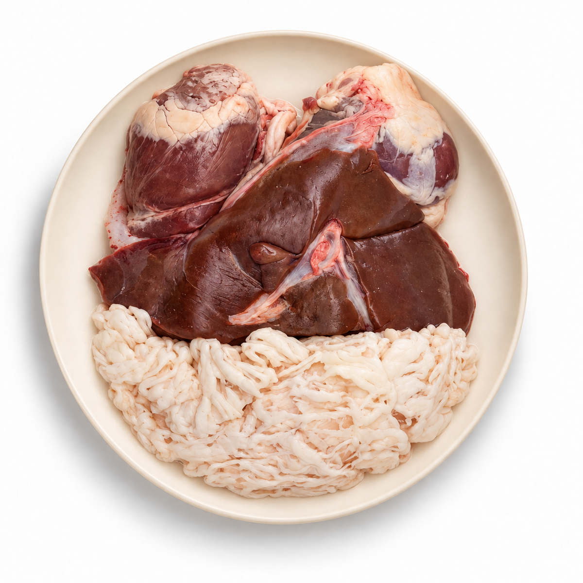 Lamb offal on an ivory plate against a white background